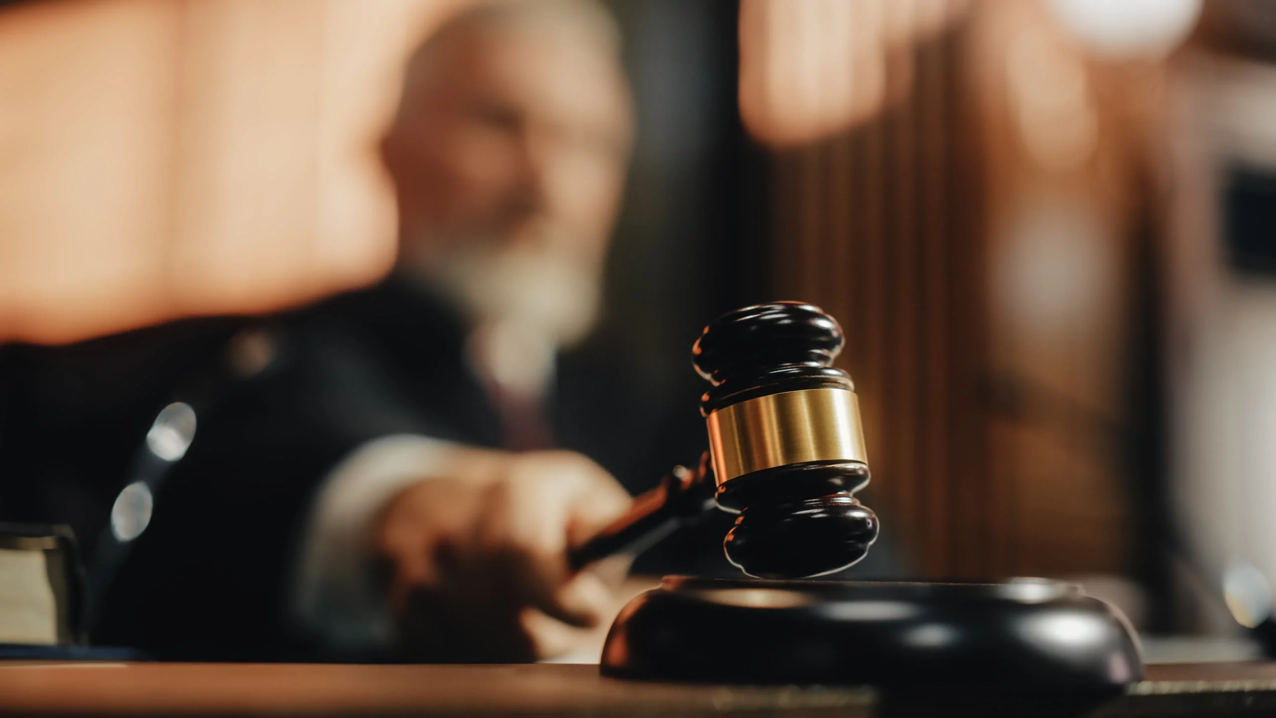 judge with gavel in cour room