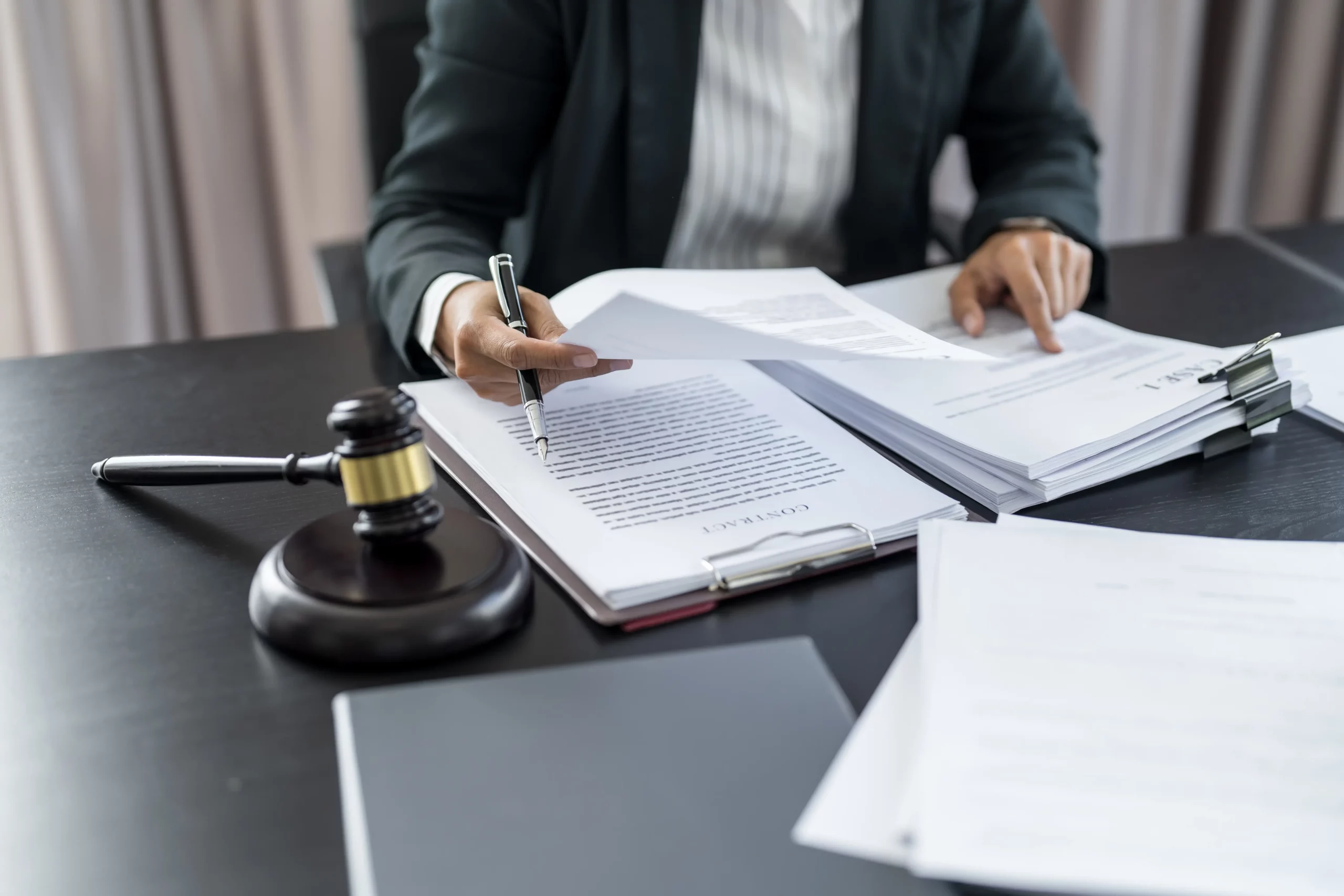 personal injury attorney writing notes